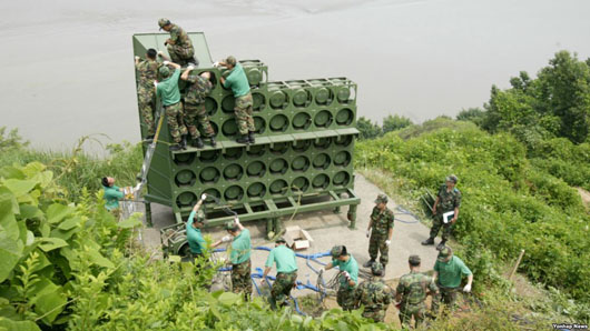 South speakers boom news of soldier defector 12 miles into N. Korea