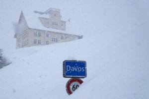 Global elites fly into Davos, risk snow drifts and avalanche threats to address global warming