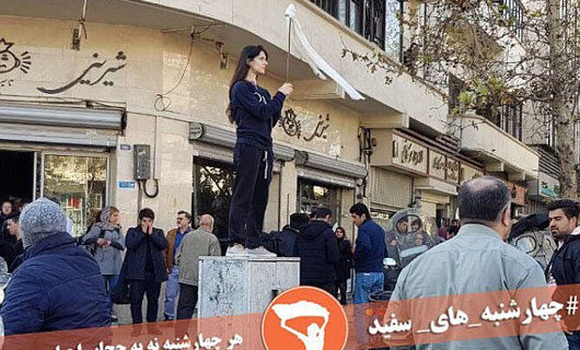Iranian women removing hijab charged with ‘inciting prostitution’