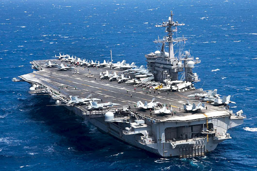 U.S. ‘uneasy’: China issues taunt as Vinson carrier group heads for South China Sea