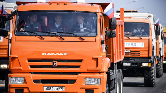 U.S. objects as Putin drives truck opening bridge to ‘occupied Crimea’