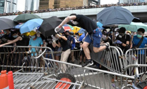 As protests turn violent, State Dept. issues warning to Hong Kong government