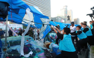 Violence in Seoul as workers hired by leftist mayor destroy conservatives’ tents