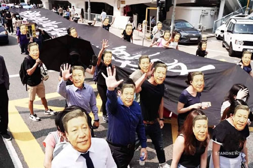 ‘Bones ground to powder,’ Xi warns; Hong Kong protesters don Xi masks