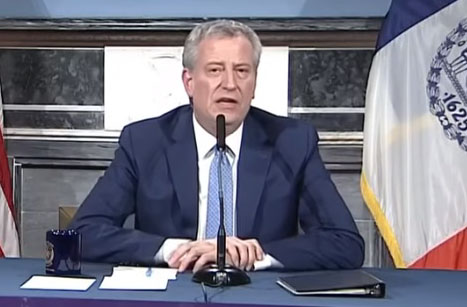After urging New Yorkers to live large, De Blasio now wants Trump to call in military