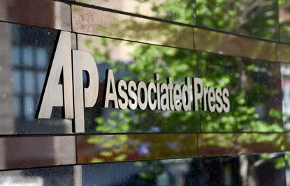 AP sells its code of journalism ethics to the Rockefeller Foundation for $750,000