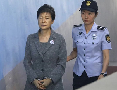 South Korea’s leftist leader pardons conservative predecessor, Park Geun-Hye