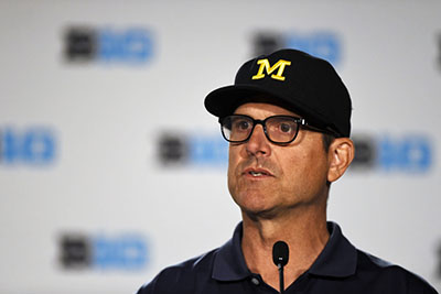 Pro-life Michigan coach Harbaugh says he and his wife will raise his players’ unplanned children