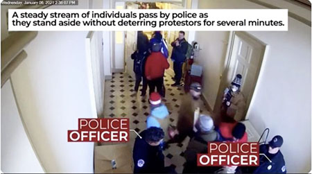 J6 video shows police holding door open, allowing hundreds of protesters to enter Capitol